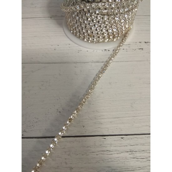 Стразы цепочкой ss12(3-3,2мм) цв. белый кристалл в серебре, цена за 50 см